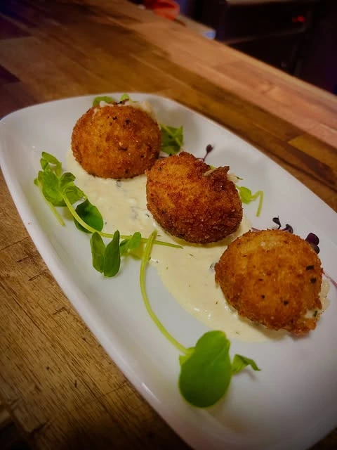Golden arancini at Italio
